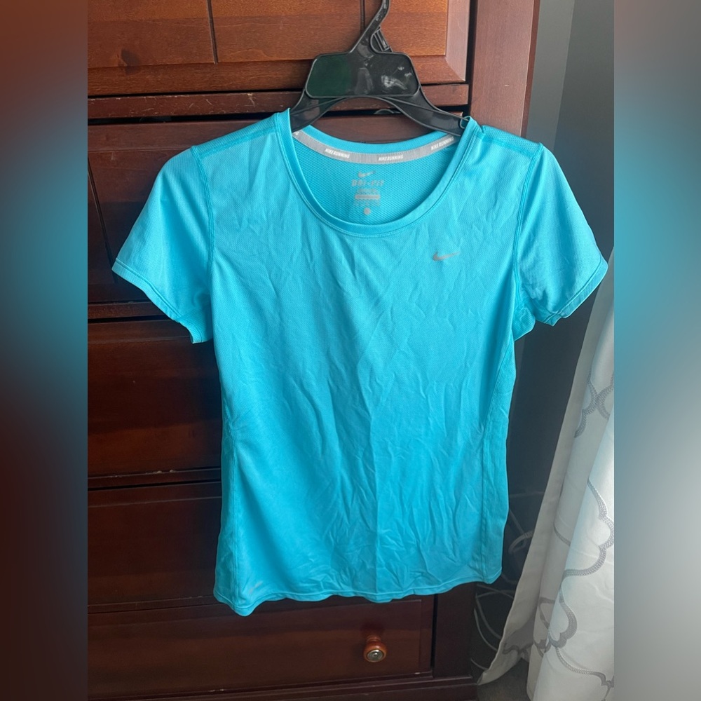 Nike workout top, gently worn, light blue